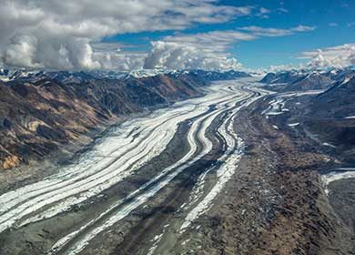 A melting glacier in a valley. Courtesy of the National Park Service and Jacob W. Frank.